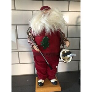 Festive Red Santa Ornament with Green Tree Accent